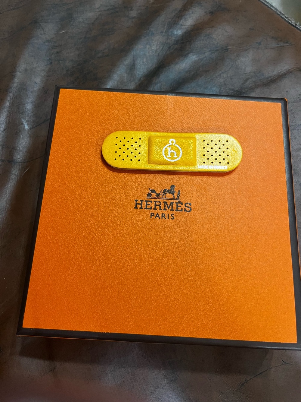 Hermes. Limited Edition Rare Leather Petite H Collection Orange Band Aid Bandage